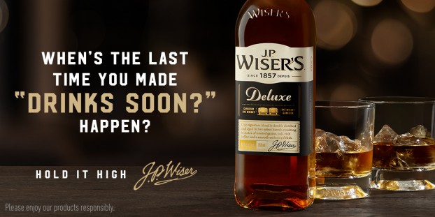 J.P. Wiser’s encouraged people to follow through on the promise of getting together socially with the headline “Drink Soon?” This is the third year in the continuing “Hold It High” campaign.