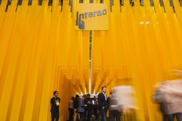Zulu reimagined the typical tradeshow booth for Interac. Six hundred bands of flowing fabric became an architectural representation of the huge volume of financial data that Interac’s systems manage every day.